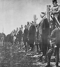 Austro-Hungarian soldiers executing Serbian civilians during World War I (1916).[65]