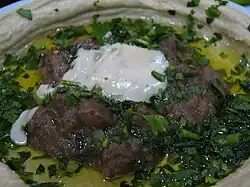 Hummus and ful topped with tahini