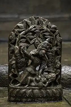 Bhimasena killing Dushasana[24]