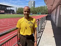 Jasmine posing for a portrait at the track &field stadium