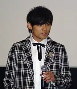 A man holding a microphone