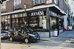 Jeeves of Belgravia shop front and van on the London high street