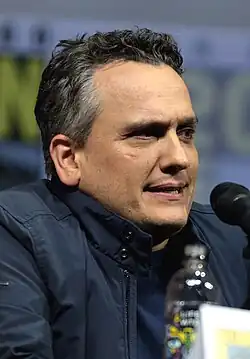 Joe Russo at a microphone