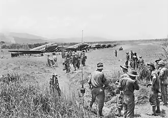 Image 83Troops of the 2/16th Battalion disembark from Dakota aircraft at Kaiapit (from Australia in World War II)