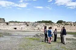 Ahmed Kathrada, who was imprisoned in Robben Island between 1964 and 1982, is pictured giving a tour of the prison to US President Barack Obama and his family in 2013.