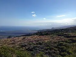 The view of the Kaʻū coastline from HVNP. Looking southwest towards Na'alehu