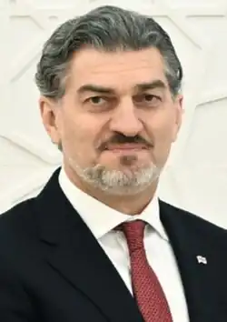 Headshot of Kavelashvili in a suit with a red tie