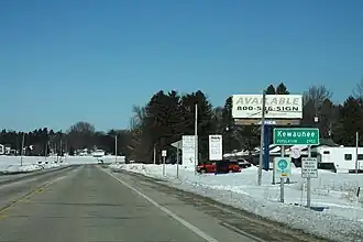 Sign at the city limits at the south of the city along Highway 42