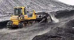 Komatsu Dozer pushing coal on the job site