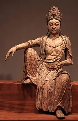 Chinese statue of Avalokiteśvara looking out over the sea, c. 1025 CE