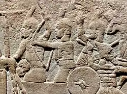 Armoured Kushite soldiers of Taharqa defending their city from the Assyrian assault