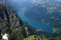 Klöntalersee viewed from Vorder Glärnisch, showing surrounding Alpine landscape
