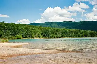 The shores of the lake, further extended due to the fluctuating water levels over the course of the summer months