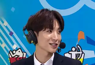 Close up of Leeteuk wearing a headset