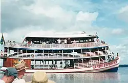 Jeff Blackard (top left) on the riverboat Linda Esperanca in Brazil in 2003.