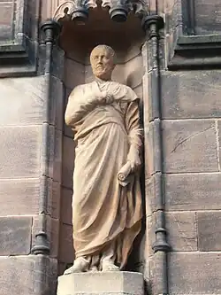 Stone statue in niche, Gladstone's Library, Hawarden, Wales, 1899
