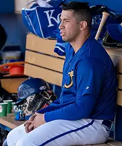 Luis Cessa sitting on the Omaha Storm Chasers bench in 2024