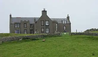Colour photograph of a stone building