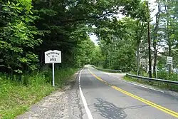 Route 23 enters Otis.