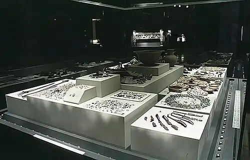 Remains of the funeral pyre and banquet