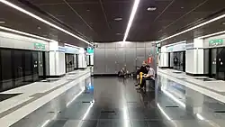 The platform level in the Maluri MRT station. The space is almost twice as wide as Masjid Jamek's platform level.