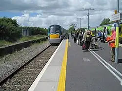 An Intercity train towards Dublin and a Commuter shuttle to Balina at Manulla Junction station, 4th June 2010