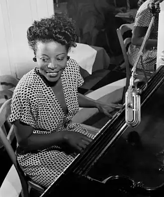 Image 5 Mary Lou Williams Photograph credit: William P. Gottlieb; restored by Adam Cuerden Mary Lou Williams (May 8, 1910 – May 28, 1981) was an American jazz pianist, arranger, and composer. She wrote hundreds of compositions and arrangements and recorded more than one hundred records. Williams wrote and arranged for Duke Ellington and Benny Goodman, and she was friend, mentor and teacher to numerous other jazz musicians. The second of eleven children, she was born in Atlanta, Georgia, and grew up in the East Liberty neighborhood of Pittsburgh, Pennsylvania. A young musical prodigy, she taught herself to play the piano at the age of three. This photograph of Williams at the piano was taken by William P. Gottlieb around 1946. More selected pictures