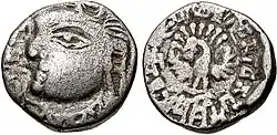 Coin of King Iśanavarman of the Maukhari of Kanyakubja, c. 535-553 CE. The ruler faces to the left, whereas in Gupta coinage the ruler faces to the right. This is possibly a symbol of antagonism and rivalry, as also seen on some similar coins of Toramana.[1] of