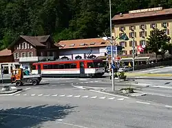 MIB car passes through centre of Innertkirchen at Innertkirchen Post