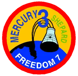 The circular patch depicts a Mercury capsule and a map of Florida, indicating the ballistic path of the capsule into the Atlantic Ocean. The words say: "Mercury 3 – Shepard – Freedom 7"