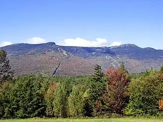 Image 52Mount Mansfield, at 4,393 feet (1,339 m), is the highest-elevation point in Vermont. Other high points are Killington Peak, Mount Ellen, Mount Abraham, and Camel's Hump. The lowest point in the state is Lake Champlain at 95 feet (29 m). The state's average elevation is 1,000 feet (300 m). (from History of Vermont)