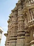 Detailed stone artwork on temple walls