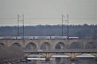 New Jersey Transit Northeast Corridor train on the bridge