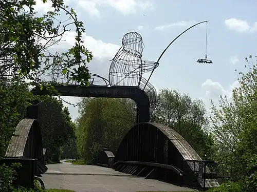Naburn railway bridge near York, showing "The Fisher of Dreams" iron cage sculpture