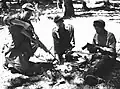 NLA soldiers cleaning their weapons