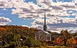 The church is commonly photographed from the northwest, allowing the fall foliage to be a backdrop