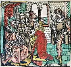 Muhammad, seated on the left, possibly reading from the Quran, as depicted in the 15th century Nuremberg Chronicle[65]