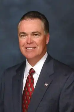 Ron Reagan is posing for his legislative portrait