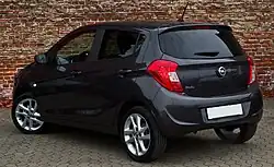 Rear windscreen has a single wiper; number plate is mounted below rear hatch