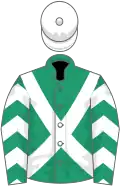 Emerald green, white cross belts, chevrons on sleeves, white cap