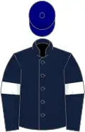 Dark blue, white armlet, navy cap