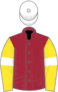 Maroon, yellow sleeves, white armlets, white cap