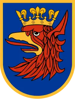 The arms of Szczecin are exempt from the rule of tincture because the crowned griffin's head is of a colour and metal.