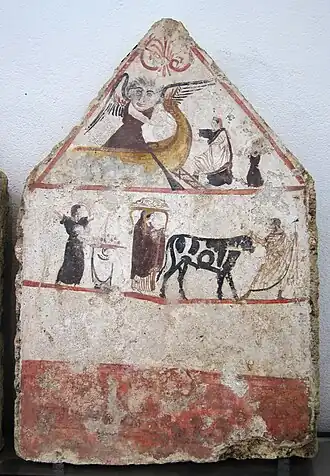 Ferryman Charon embarks with the soul of the deceased. Fresco from an ancient Lucanian tomb.