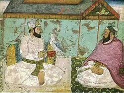 Bhai Rupa Chand (right) with Guru Hargobind (left).