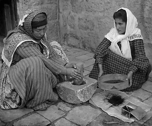 Image 46Palestinian women grinding coffee, 1905 (from History of coffee)