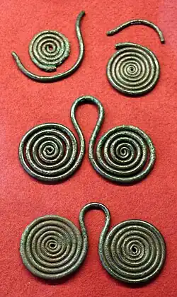 Double spiral bronze pendants, from the island of Giglio, Campese region, 10th-9th century.