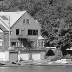 Pennsylvania Barge Club, #4 Boathouse Row in 1972 with a Drexel "D" painted on the dock.