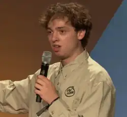 Headshot of Peter McIndoe, a young white man with light brown hair.