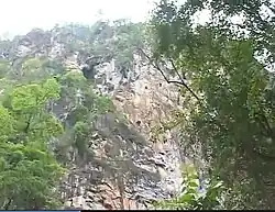At the bottom of Ban Phou Pheung Noi, the only way to reach the other side of the Nam Ngum river during the rainy season is to climb the above cliffs.